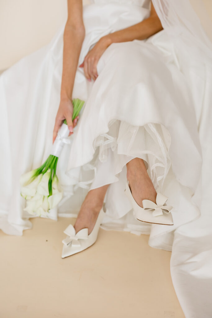 Close-up of bridal gown details during a luxury bridal portrait session in Cincinnati